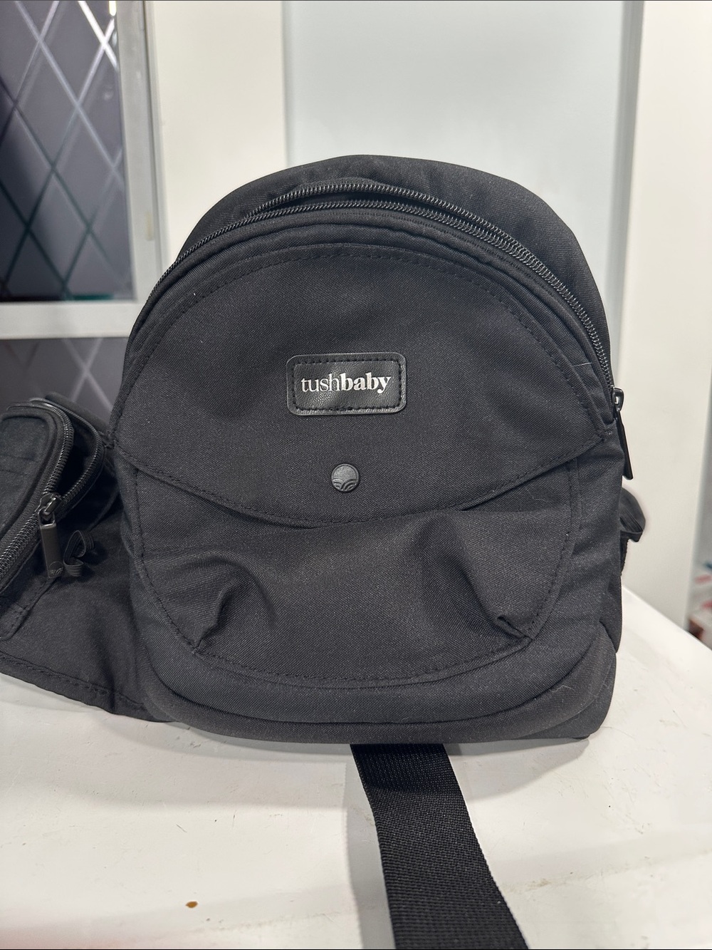 Tushbaby Compact Black Sling Backpack